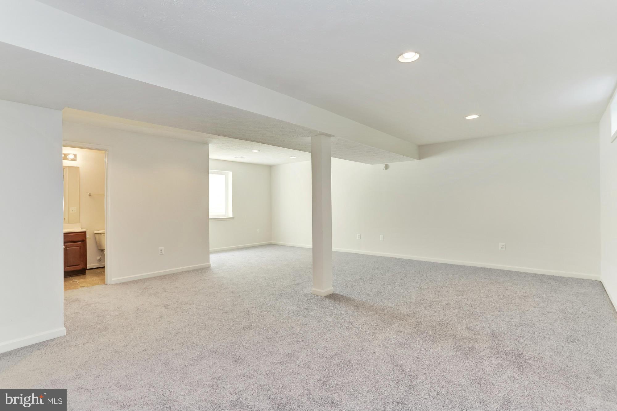 9637 Biggs Road Middle River, MD 21220 - Photo 28 of 30 a view of an empty room and a window