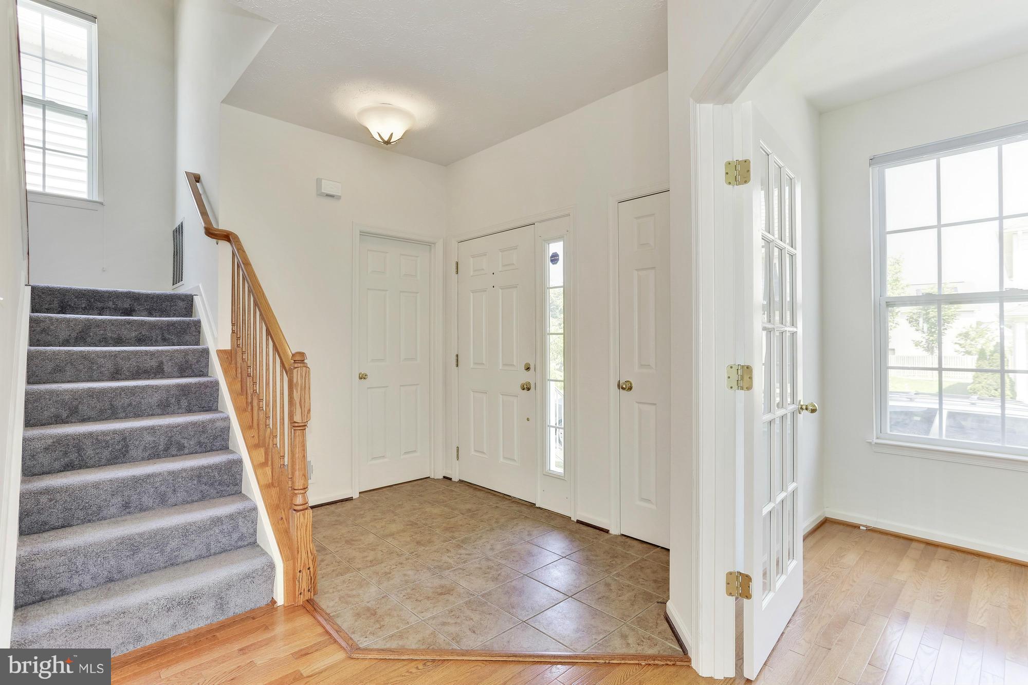 9637 Biggs Road Middle River, MD 21220 - Photo 4 of 30 a view of entryway with wooden floor and front door