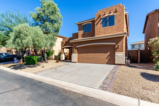 a front view of house with street