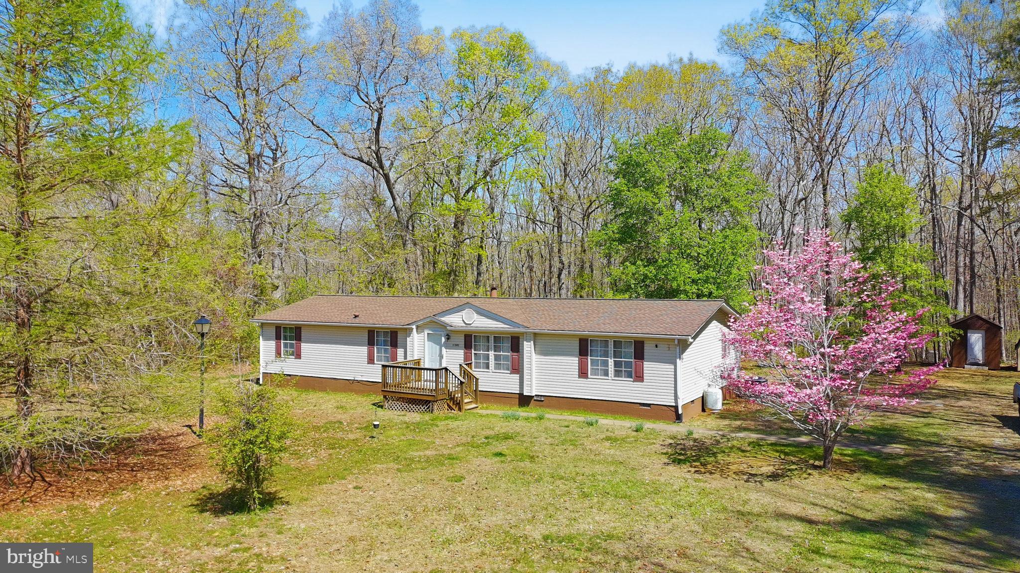 19341 Lahore Road Orange, VA 22960 - Photo 1 of 39 a front view of a house with a yard