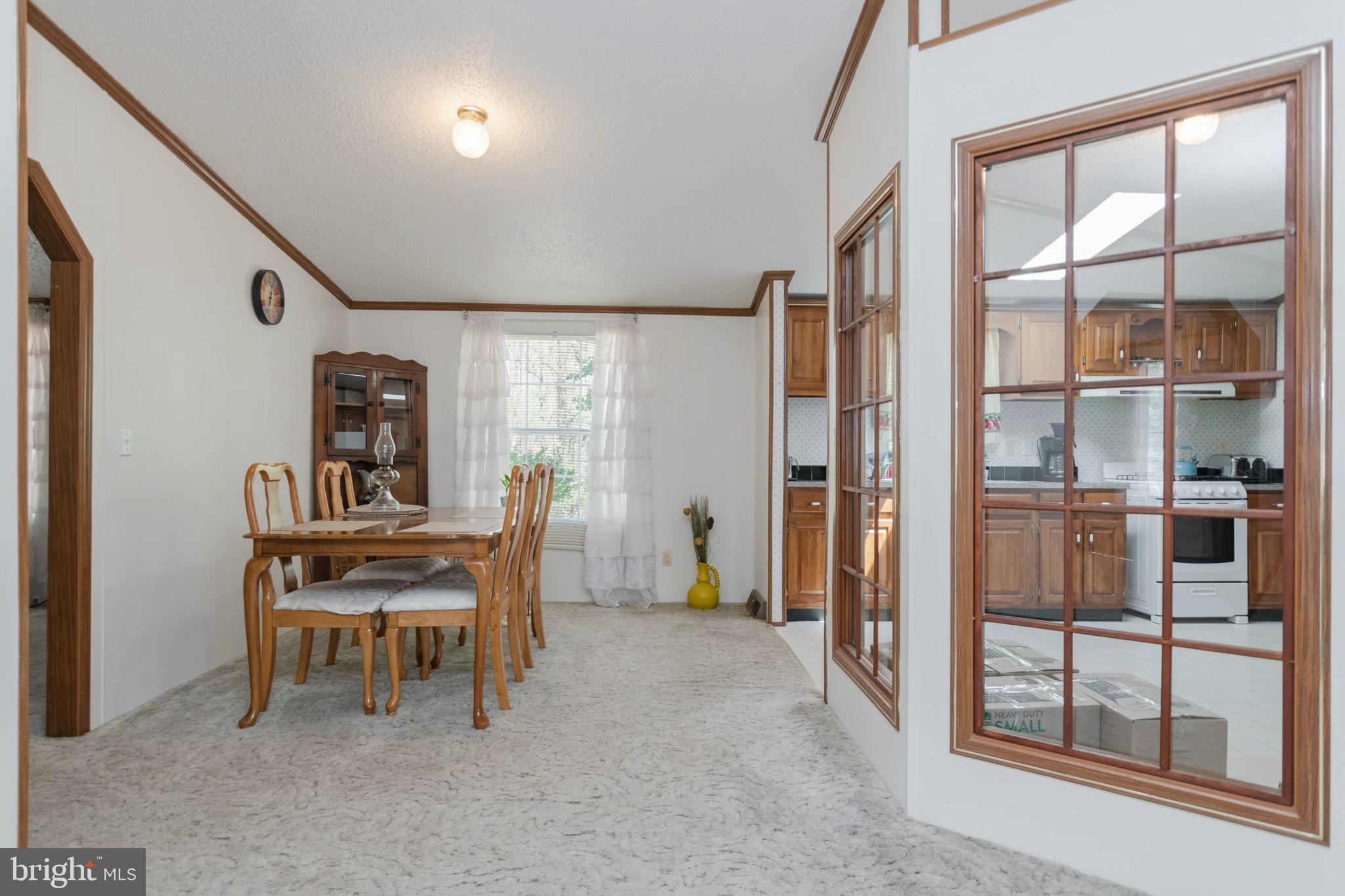 19341 Lahore Road Orange, VA 22960 - Photo 14 of 39 a dining room with furniture and a window