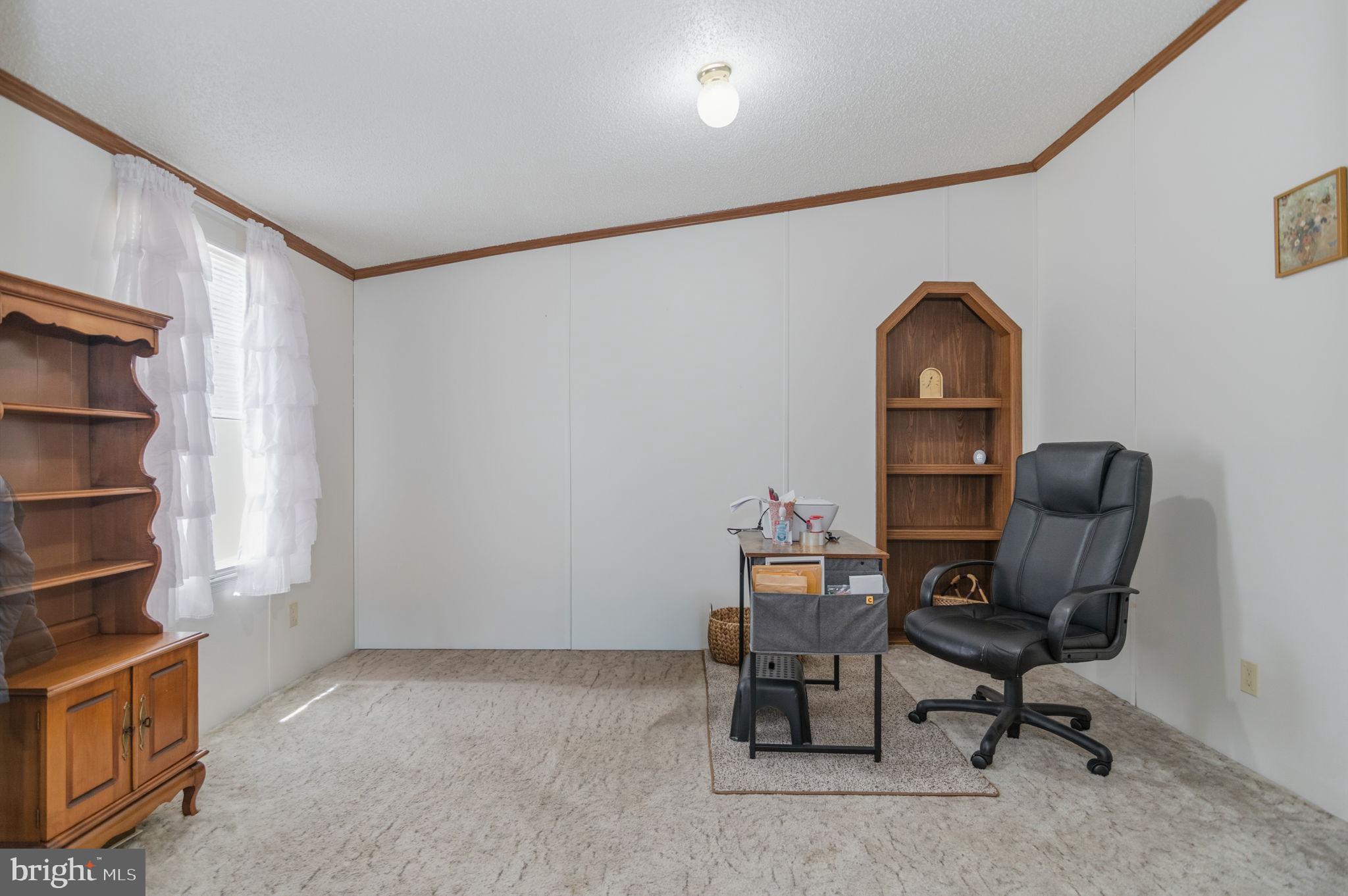 19341 Lahore Road Orange, VA 22960 - Photo 24 of 39 a view of a workspace with furniture and a window