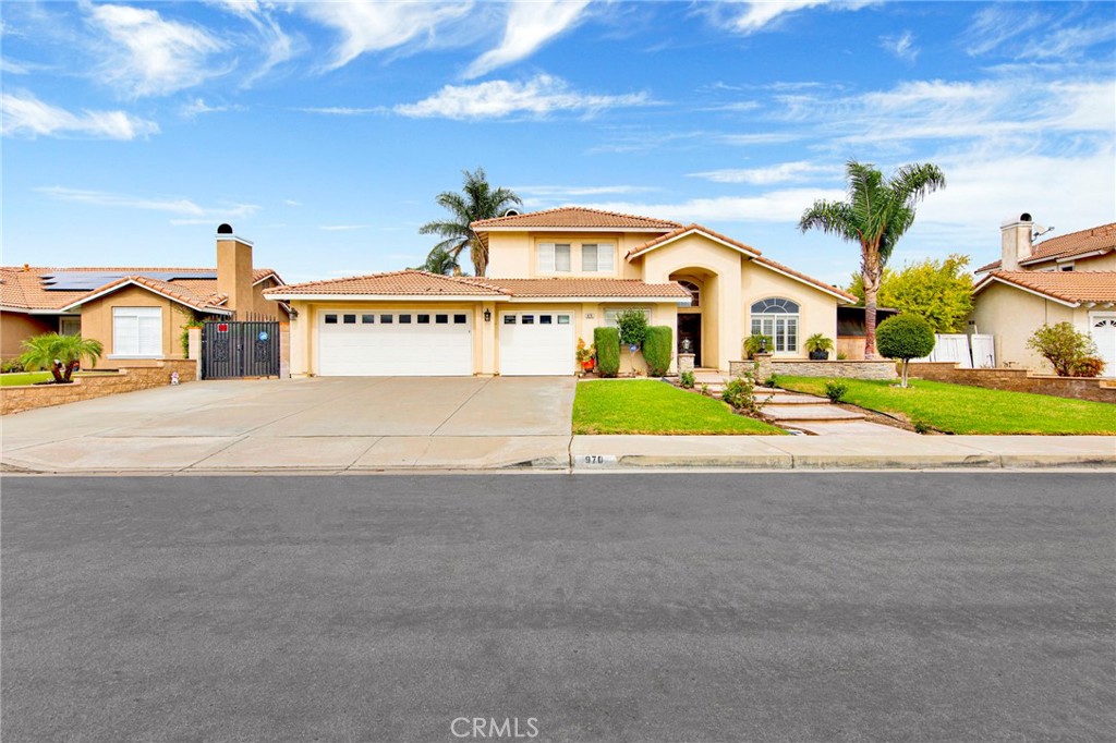 a view of swimming pool in front of residential houses