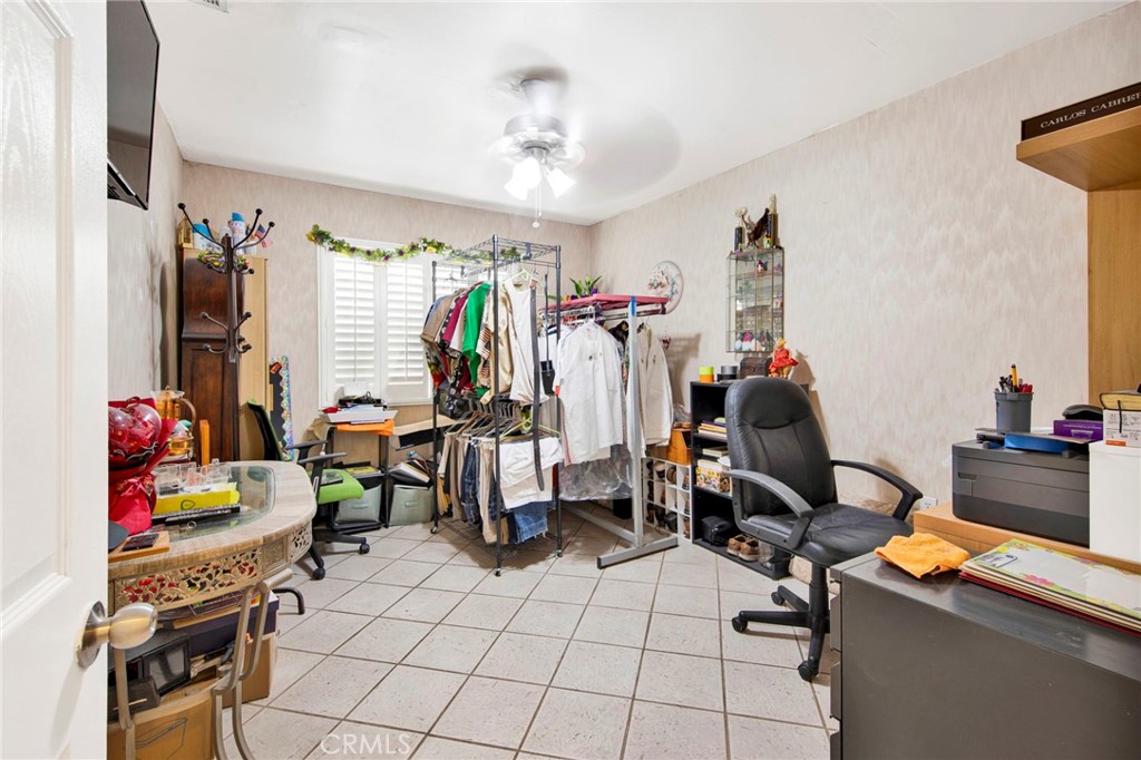 970 West Norwood Street Rialto, CA 92377 - Photo 9 of 17 a view of a room with workspace and music instruments