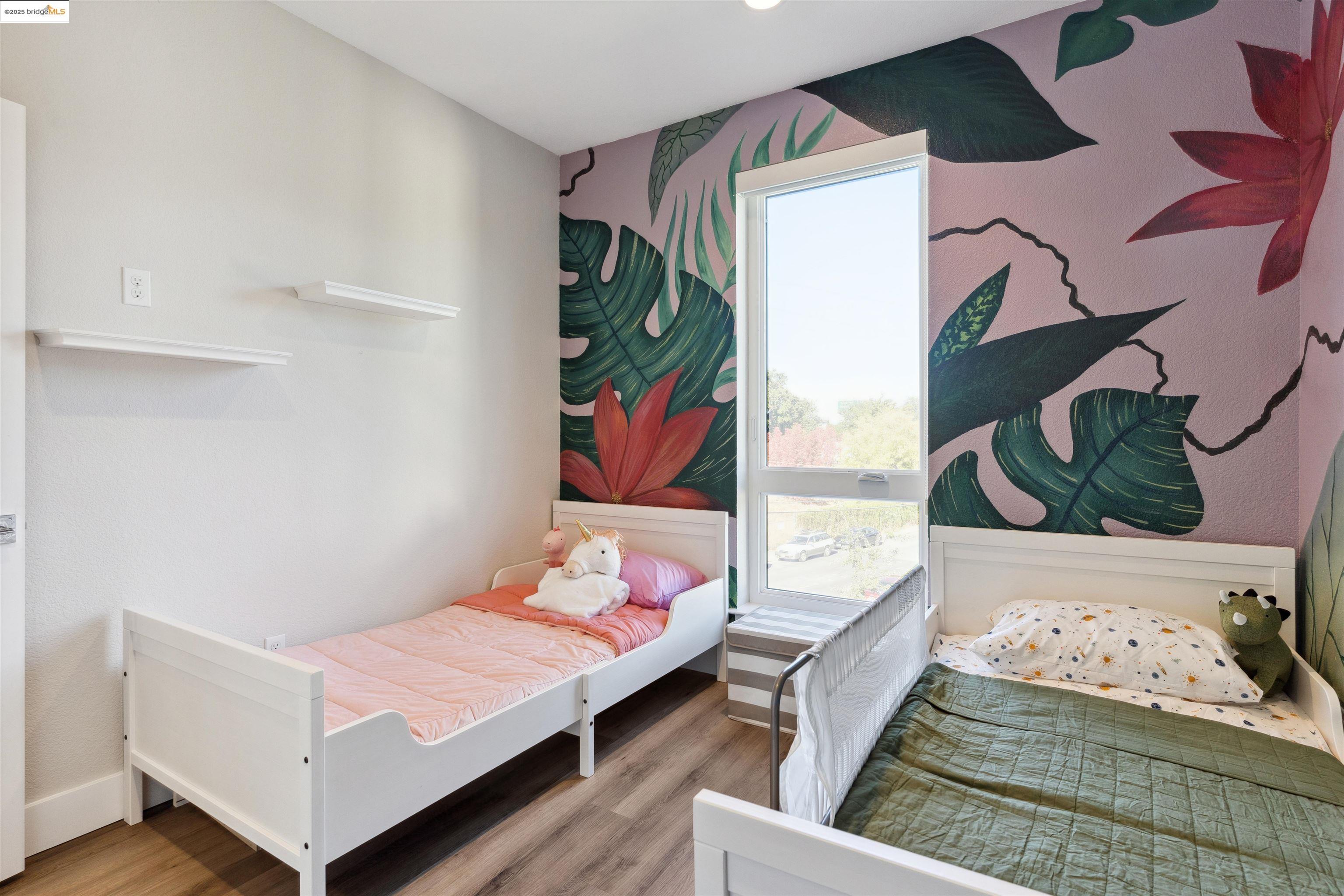 2640 Jones Road, Unit A Walnut Creek, CA 94597 - Photo 37 of 43 Bedroom with wood finished floors and baseboards