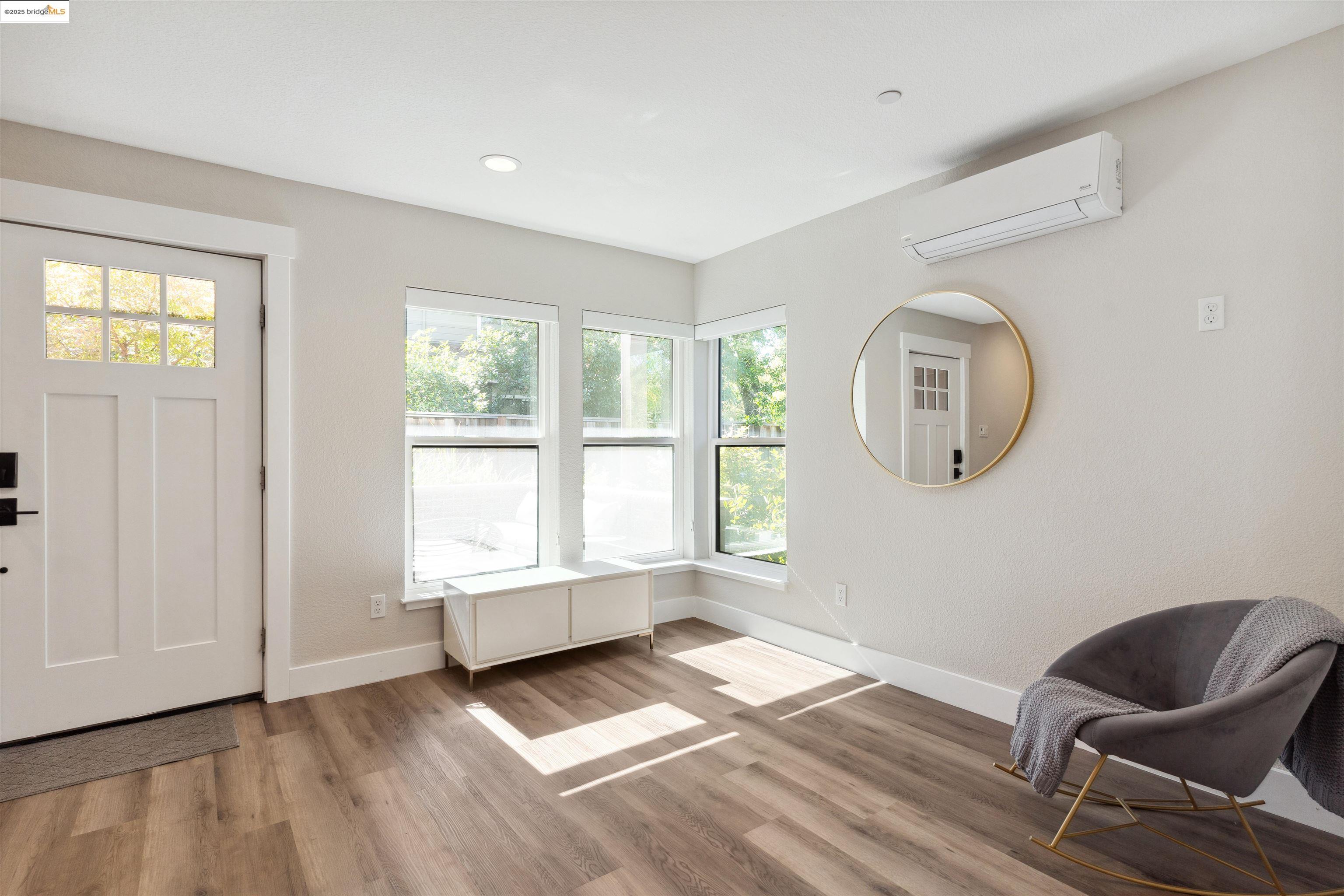 2640 Jones Road, Unit A Walnut Creek, CA 94597 - Photo 8 of 43 a view of a room with wooden floor and windows