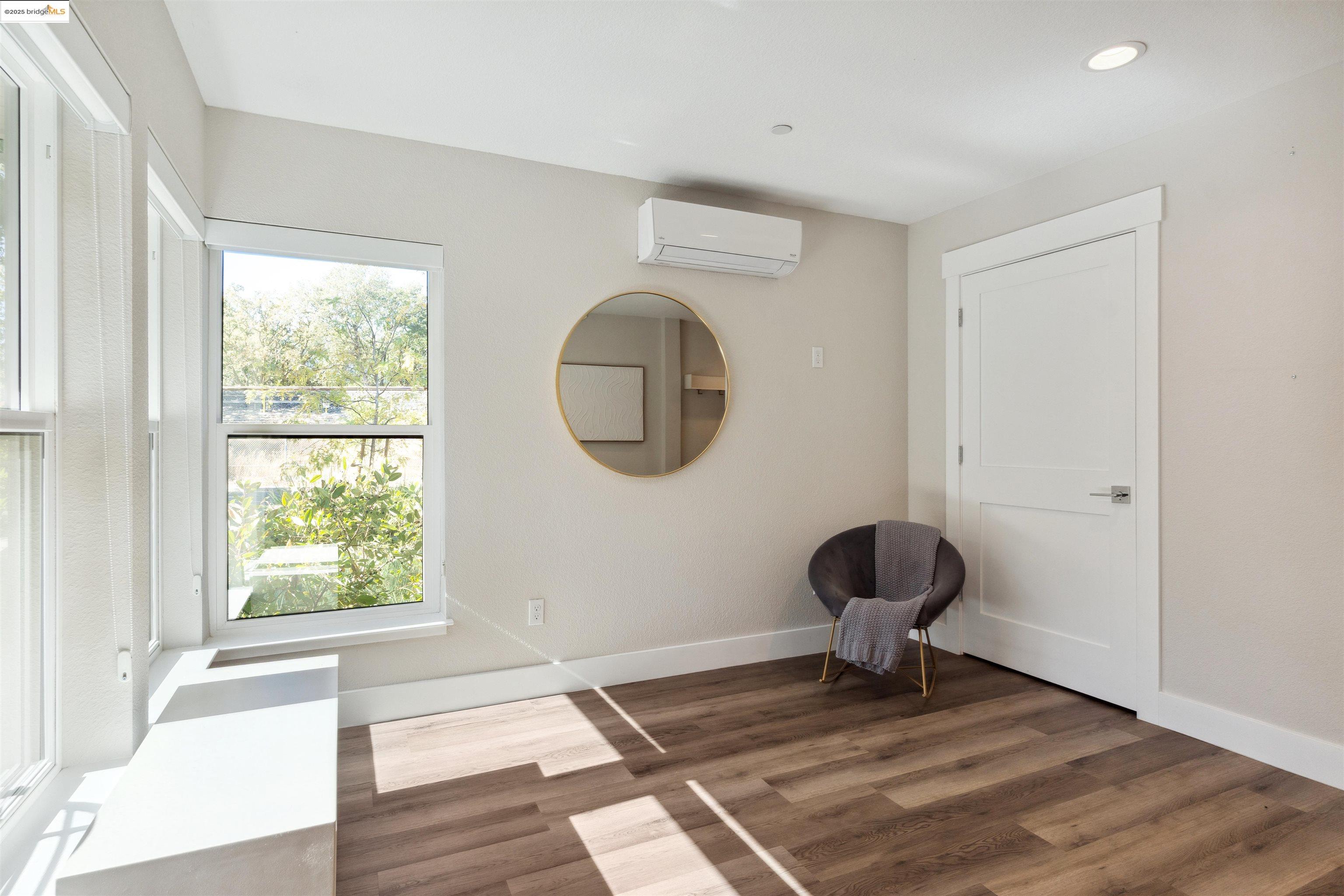 2640 Jones Road, Unit A Walnut Creek, CA 94597 - Photo 9 of 43 a view of a livingroom with wooden floor and a window
