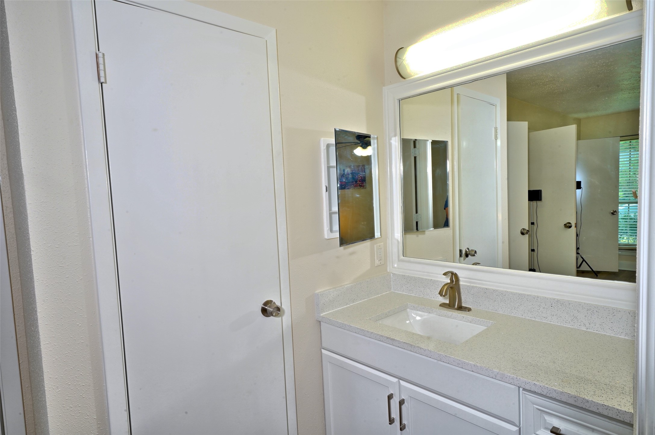 16715 Maplemont Drive Houston, TX 77095 - Photo 15 of 24 The Primary Ensuite bath vanity. Quartz countertop and an undermount sink.