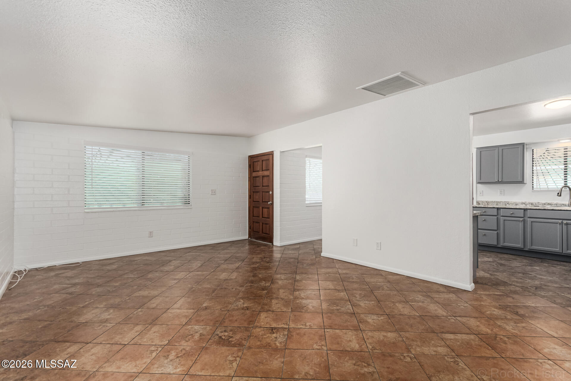 17 East Los Reales Road Tucson, AZ 85756 - Photo 10 of 27 a view of an empty room with a window