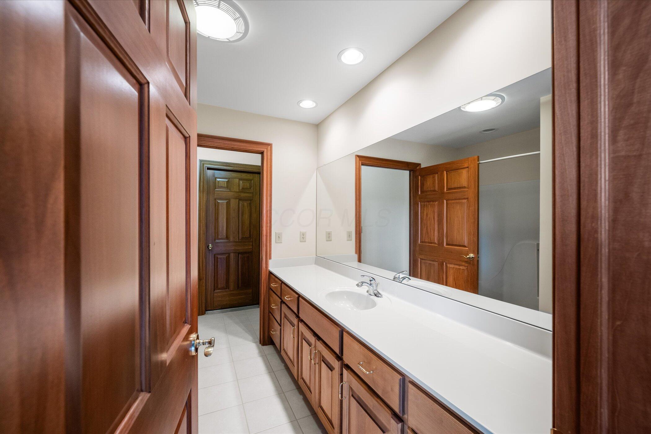 18261 Boerger Road Marysville, OH 43040 - Photo 51 of 94 Great Vanity - extra closet space and attic storage through the second door!
