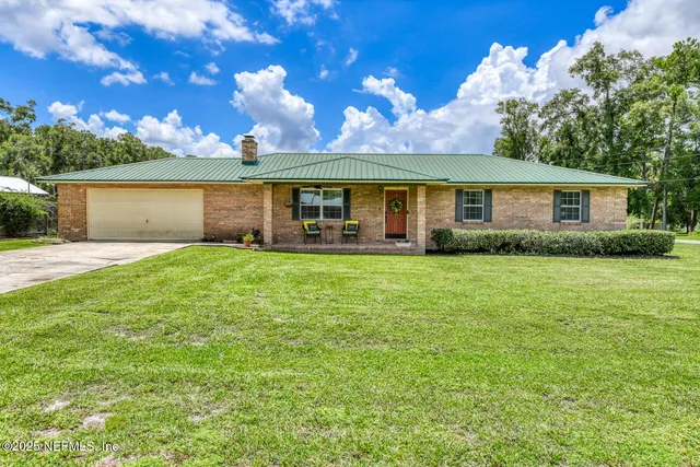 front view of a house with a yard
