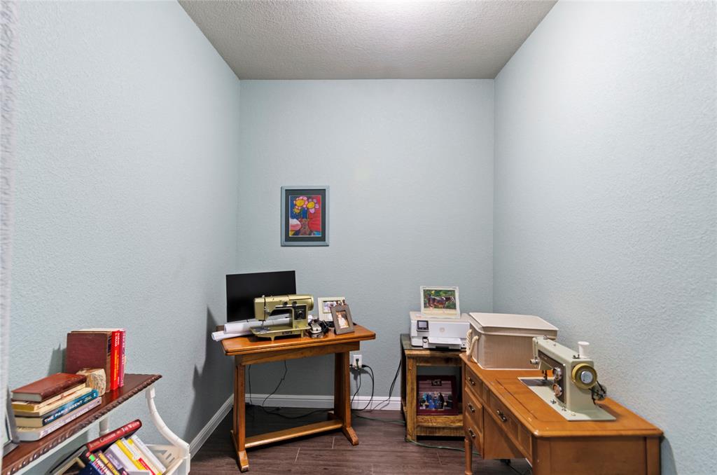 6093 Farm To Market Road 730 North Decatur, TX 76234 - Photo 17 of 28 a room with furniture and wooden floor