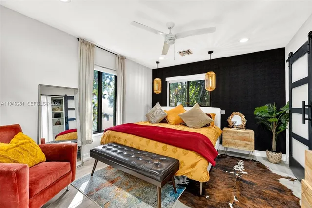 a bed room with a bed and a couch