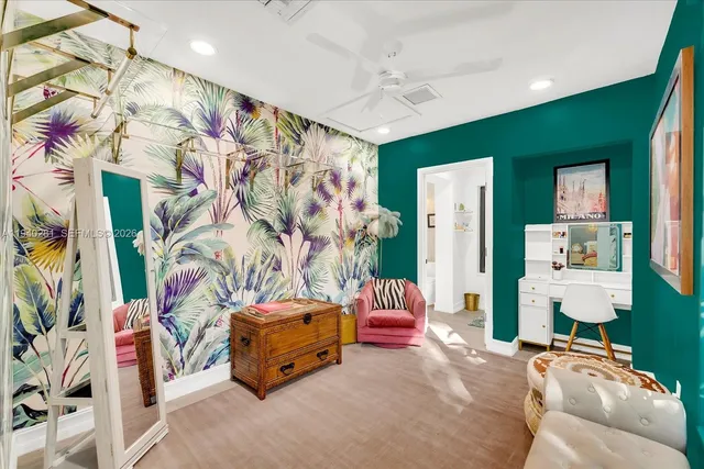 a bedroom with furniture and a bed