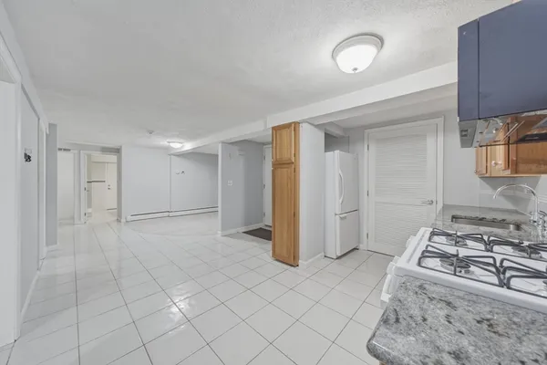 a view of a kitchen with a sink