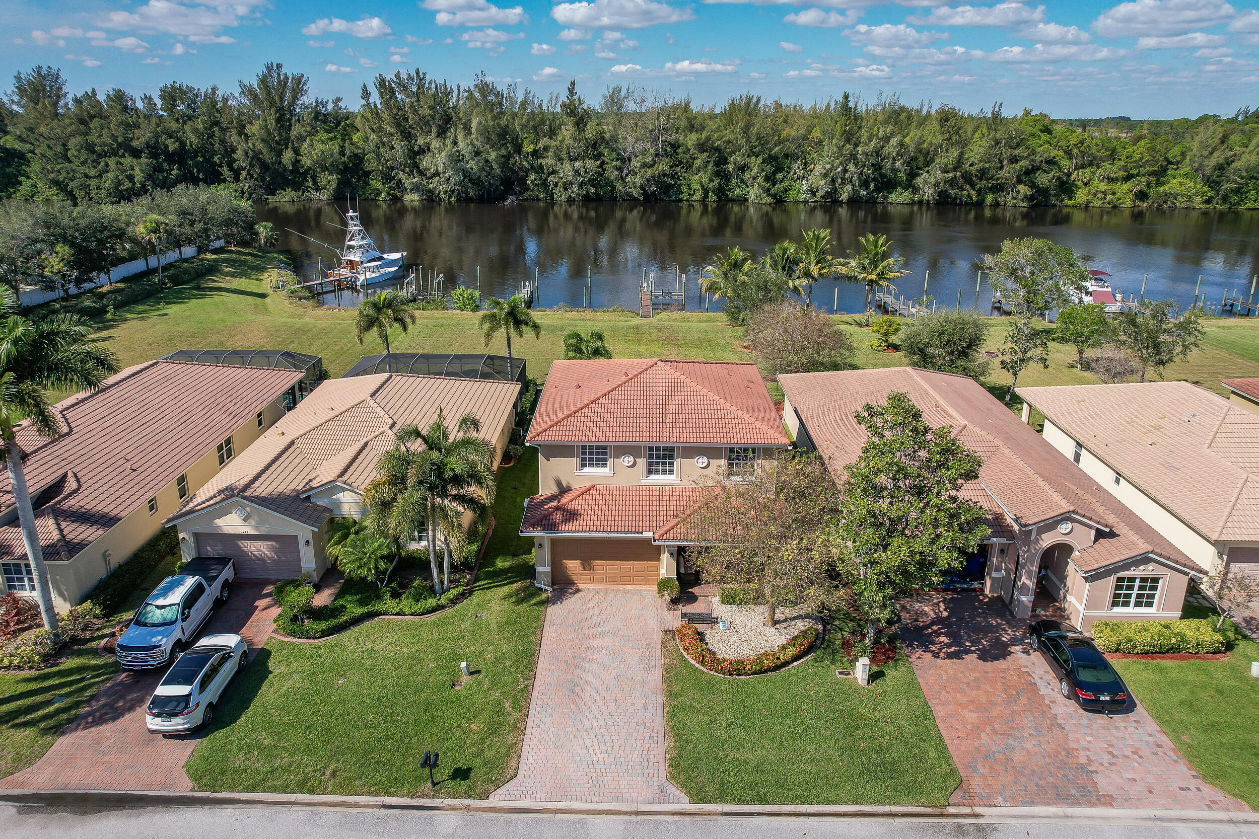 3285 Southwest Porpoise Circle Stuart, FL 34997 - Photo 48 of 69 an aerial view of a house with garden space and lake view