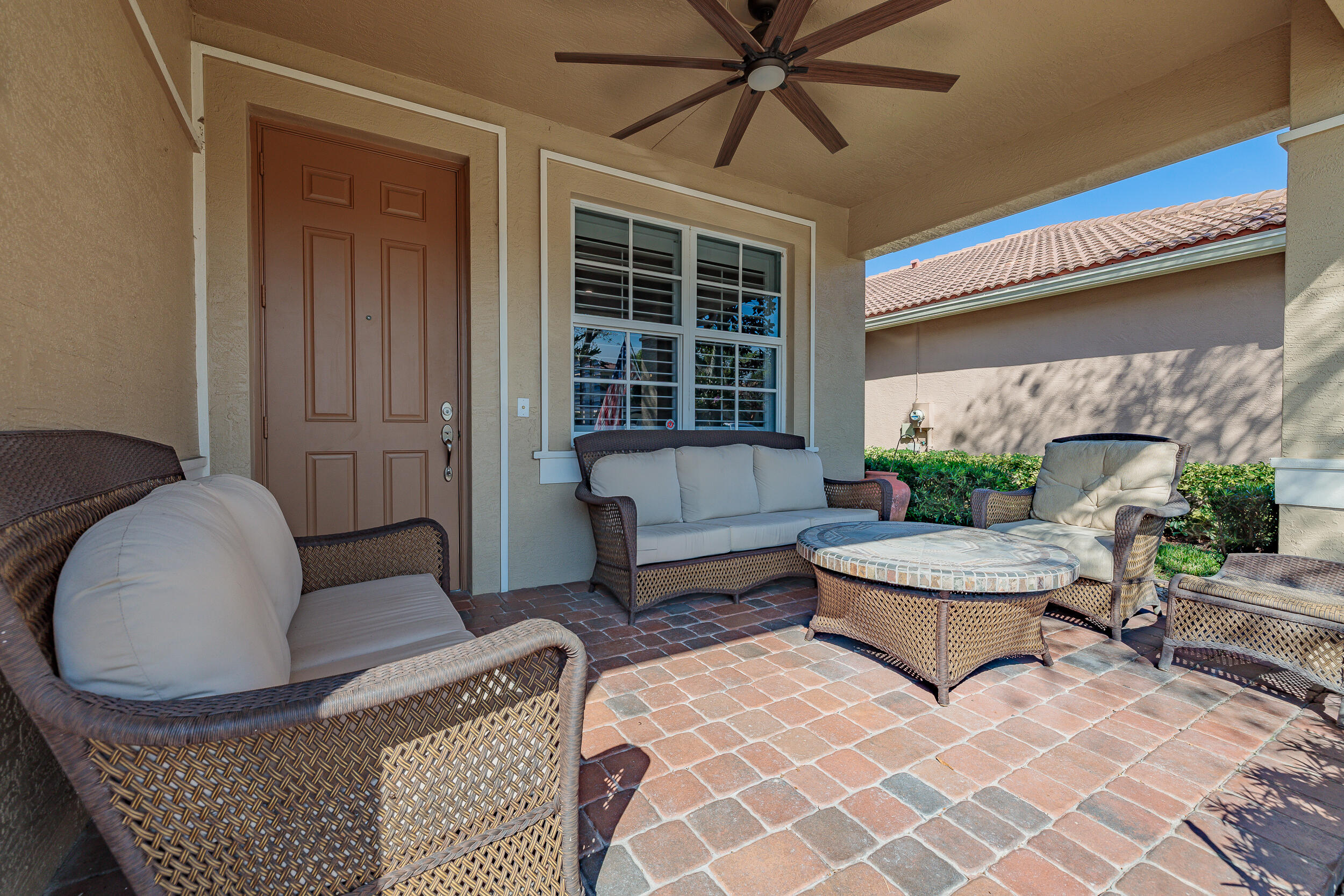 3285 Southwest Porpoise Circle Stuart, FL 34997 - Photo 5 of 69 a living room with furniture and a potted plant