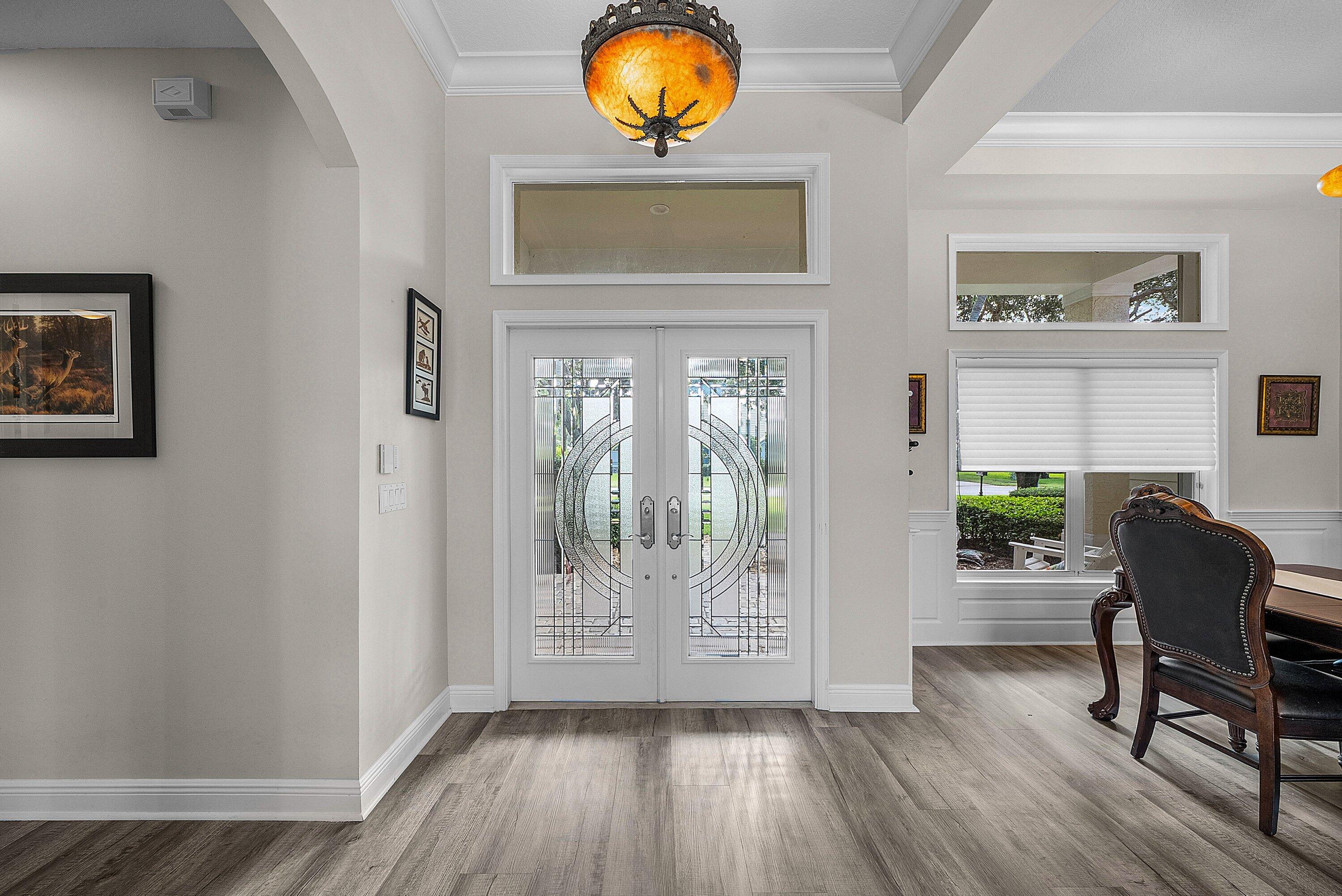18670 Southeast Lakeside Way Jupiter, FL 33469 - Photo 7 of 56 a living room with furniture and a window