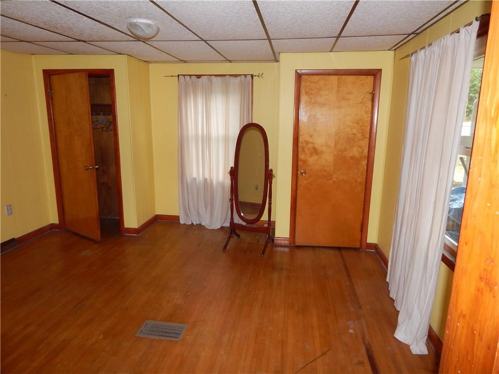 2811 Oneida Valley Road Parker, PA 16049 - Photo 14 of 23 MASTER BEDROOM WITH A HIS AND HER CLOSET