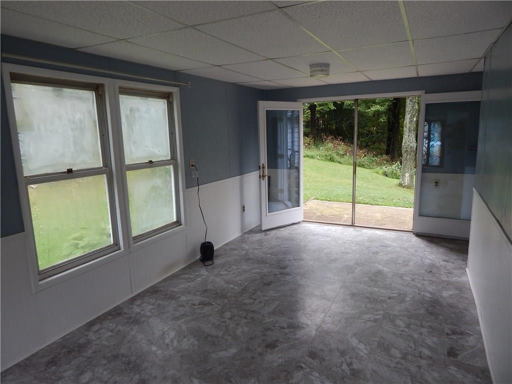 2811 Oneida Valley Road Parker, PA 16049 - Photo 9 of 23 DINING AREA WITH FRENCH DOORS TO THE BACK PATIO