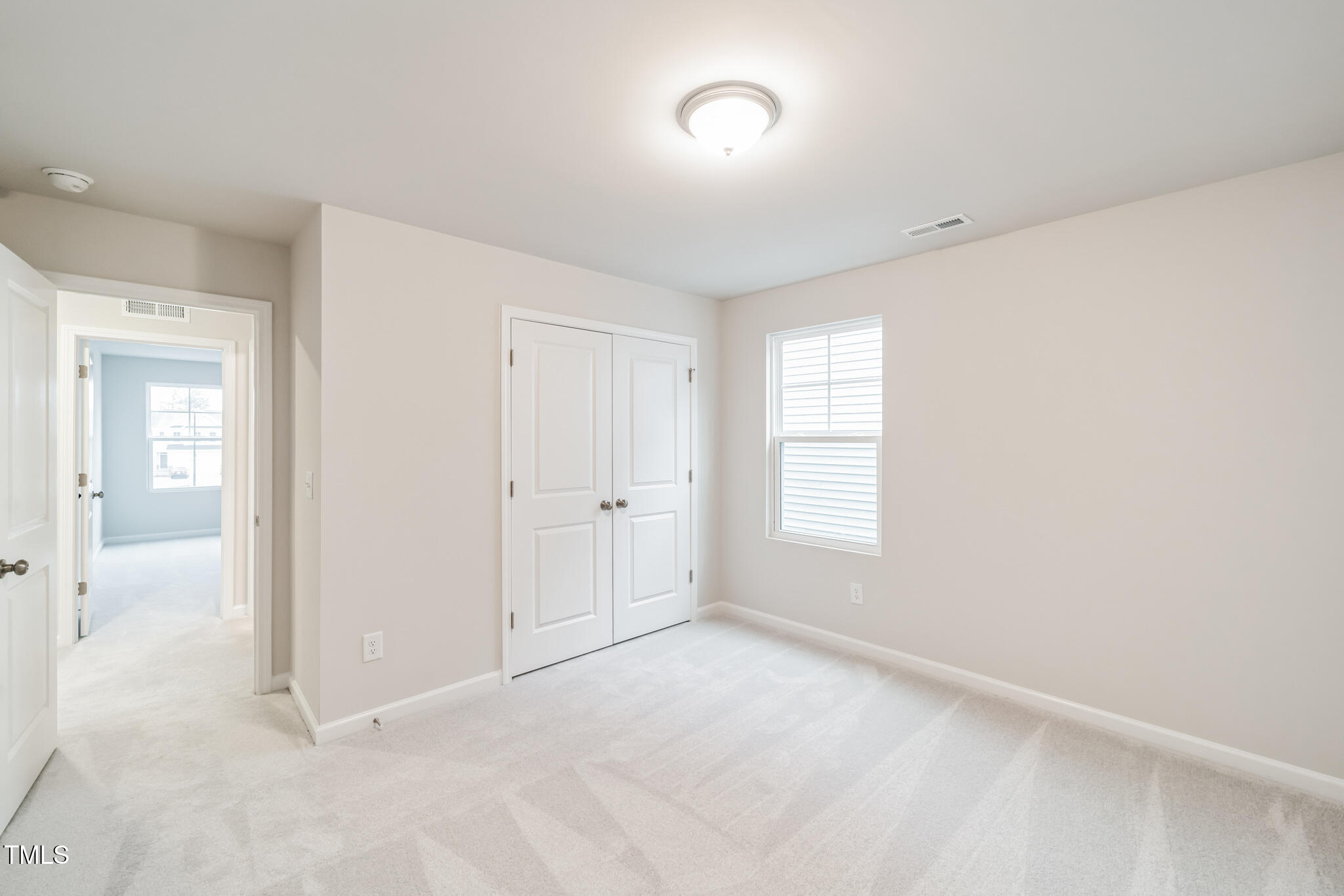 1422 Maple Br Circle Graham, NC 27253 - Photo 44 of 45 a view of an empty room with a window