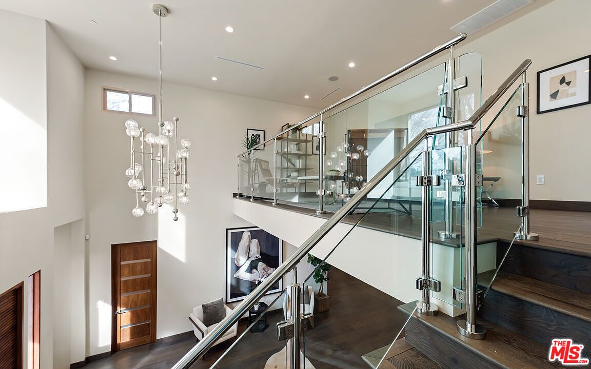 2408 Castle Heights Avenue Los Angeles, CA 90034 - Photo 14 of 28 a view of entryway and hall with wooden floor