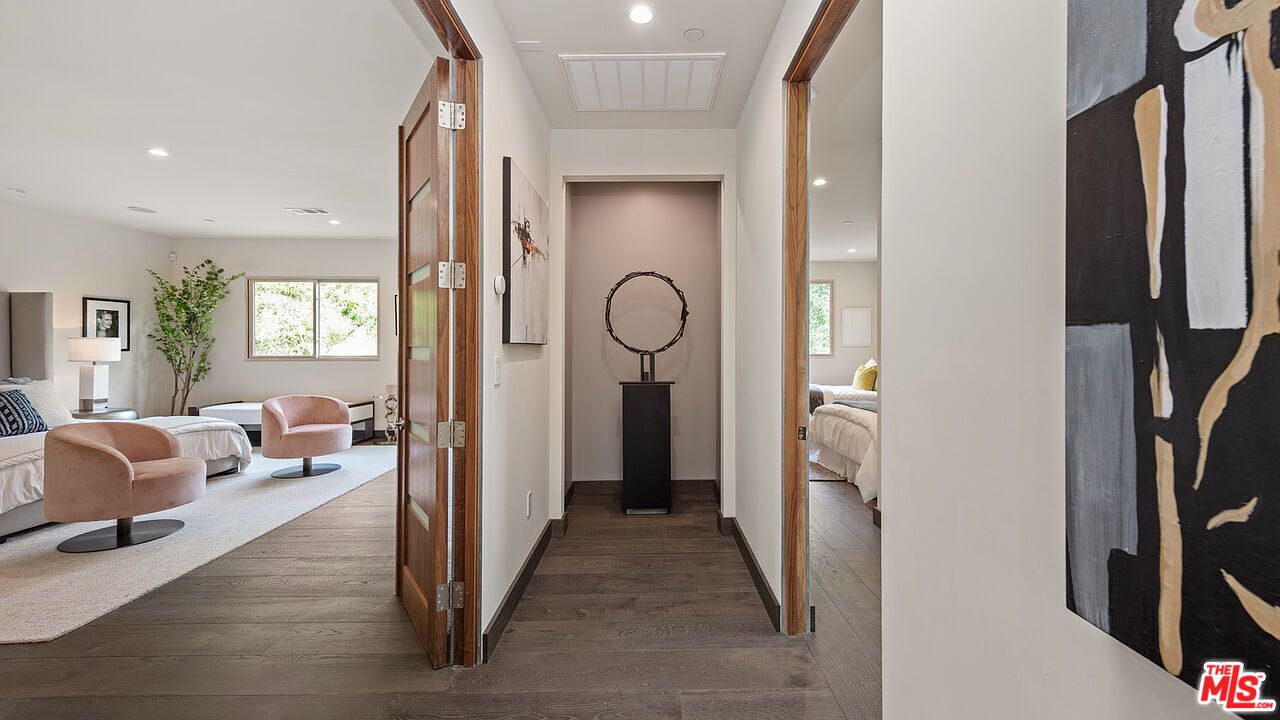2408 Castle Heights Avenue Los Angeles, CA 90034 - Photo 25 of 28 a view of a hallway with livingroom and furniture
