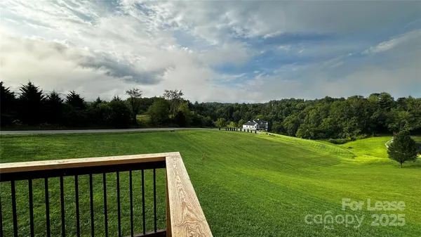 a view of a golf course with a garden