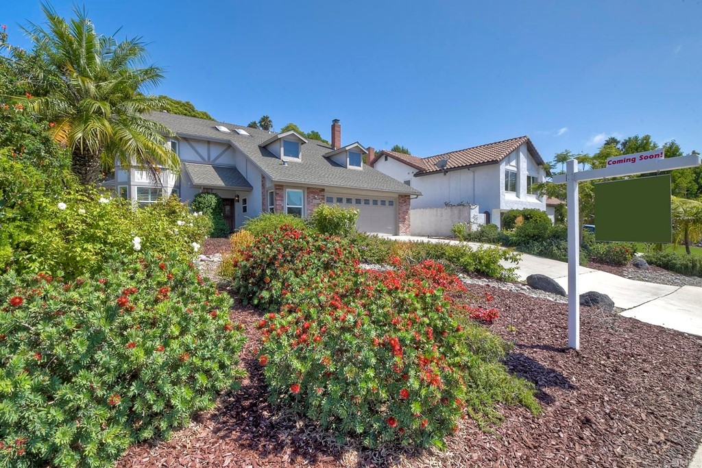 2270 Valley Road Oceanside, CA 92056 - Photo 2 of 37 a front view of a house with a yard and potted plants