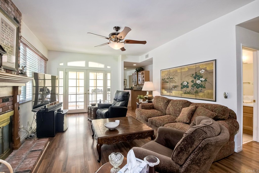 2270 Valley Road Oceanside, CA 92056 - Photo 14 of 37 a living room with furniture large window and wooden floor