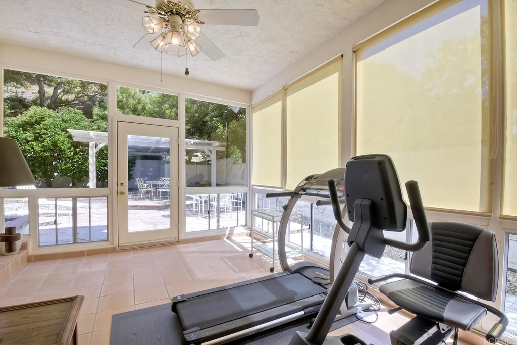 2270 Valley Road Oceanside, CA 92056 - Photo 18 of 37 a view of a dining room with furniture wooden floor and chandelier