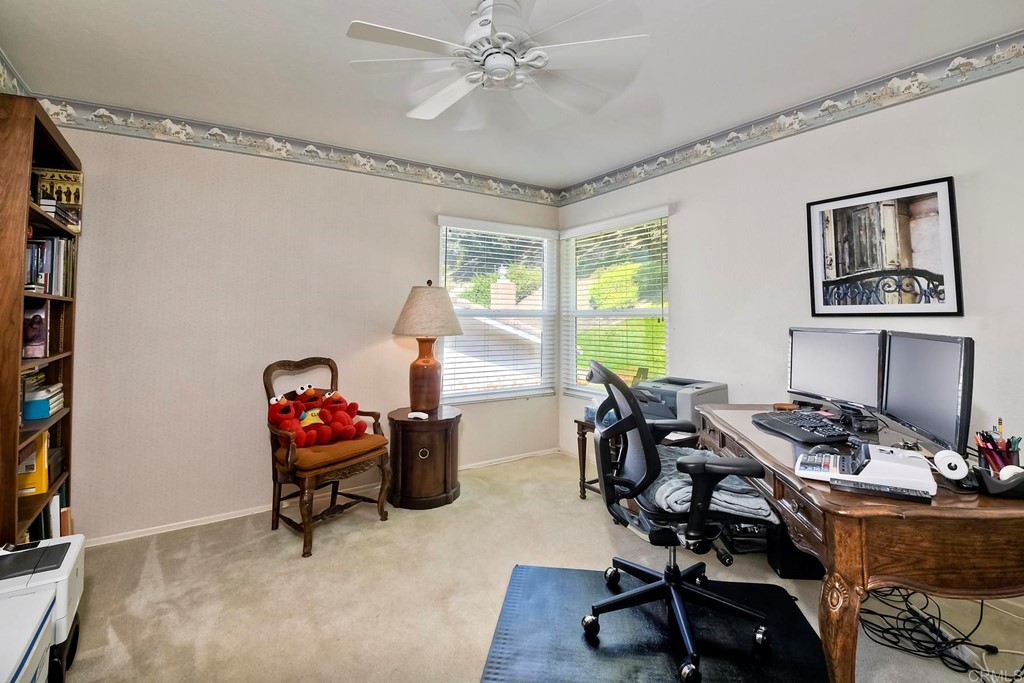 2270 Valley Road Oceanside, CA 92056 - Photo 31 of 37 a view of a workspace with furniture and a window