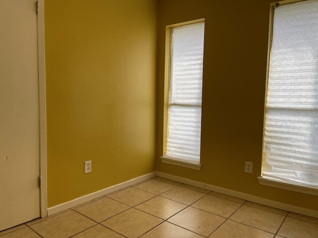 12019 Kings Grove Drive Houston, TX 77044 - Photo 11 of 50 a view of an empty room with window