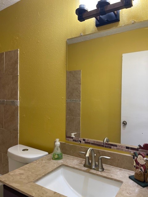 12019 Kings Grove Drive Houston, TX 77044 - Photo 29 of 50 a bathroom with a sink and a mirror