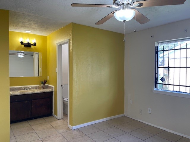 12019 Kings Grove Drive Houston, TX 77044 - Photo 30 of 50 a bathroom with a sink and a mirror