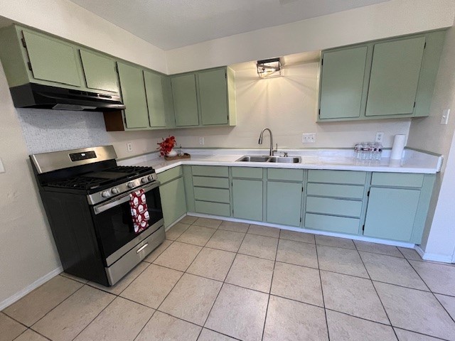 12019 Kings Grove Drive Houston, TX 77044 - Photo 33 of 50 a kitchen with stainless steel appliances granite countertop a sink and a stove