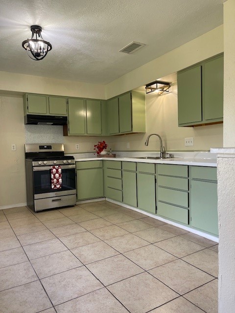 12019 Kings Grove Drive Houston, TX 77044 - Photo 4 of 50 a kitchen with stainless steel appliances a sink and a stove
