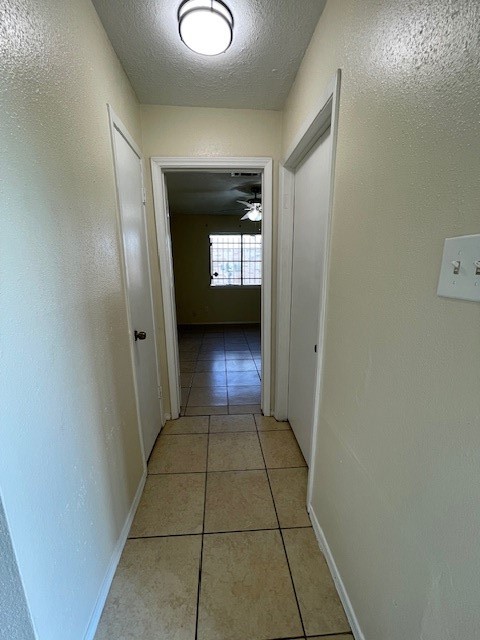 12019 Kings Grove Drive Houston, TX 77044 - Photo 46 of 50 a view of hallway with window and stairs