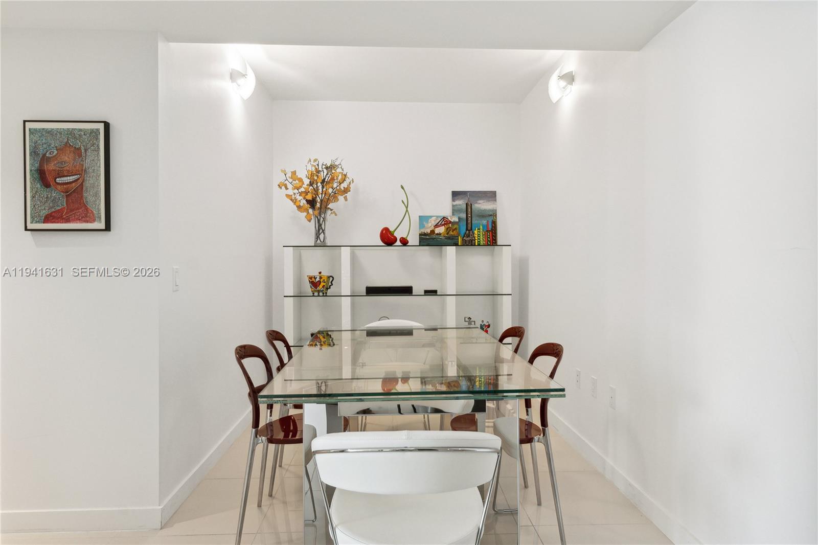 31 Southeast 6th Street, Unit 2007 Miami, FL 33131 - Photo 7 of 22 a dining room with table and chairs