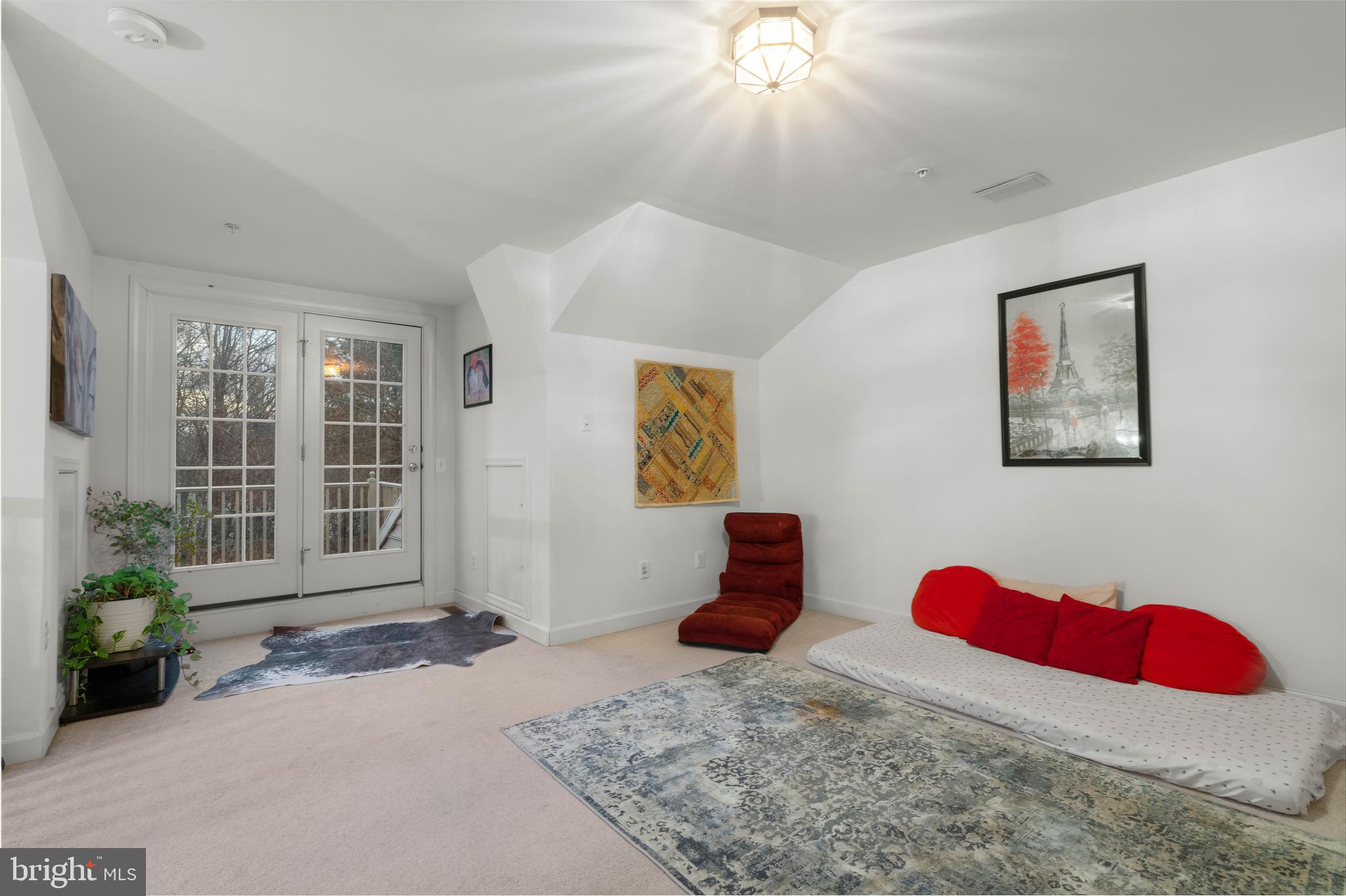 12461 Rose Path Circle Fairfax, VA 22033 - Photo 21 of 43 a bedroom with a bed and a chandelier