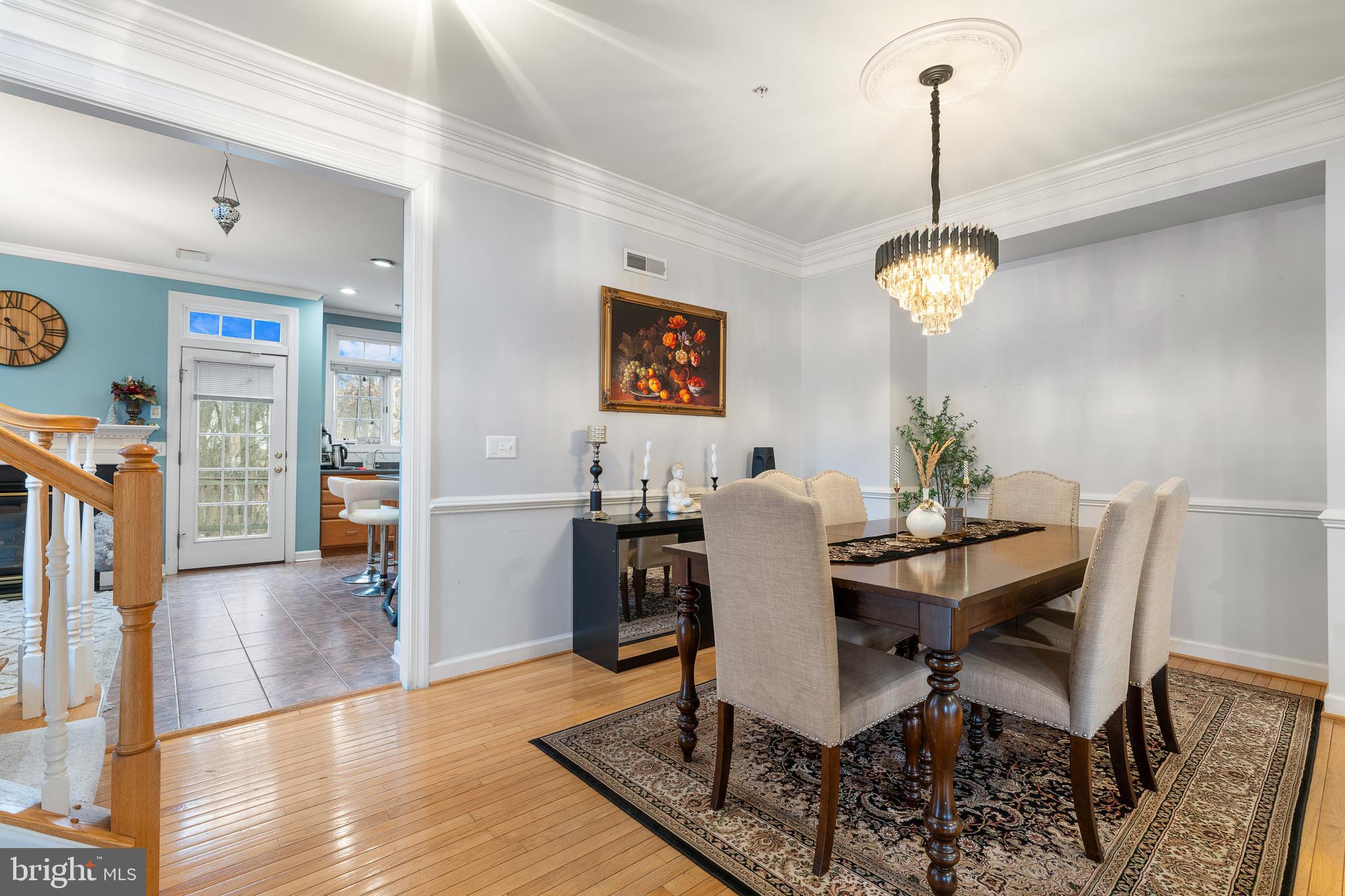12461 Rose Path Circle Fairfax, VA 22033 - Photo 3 of 43 a view of a dining room with furniture