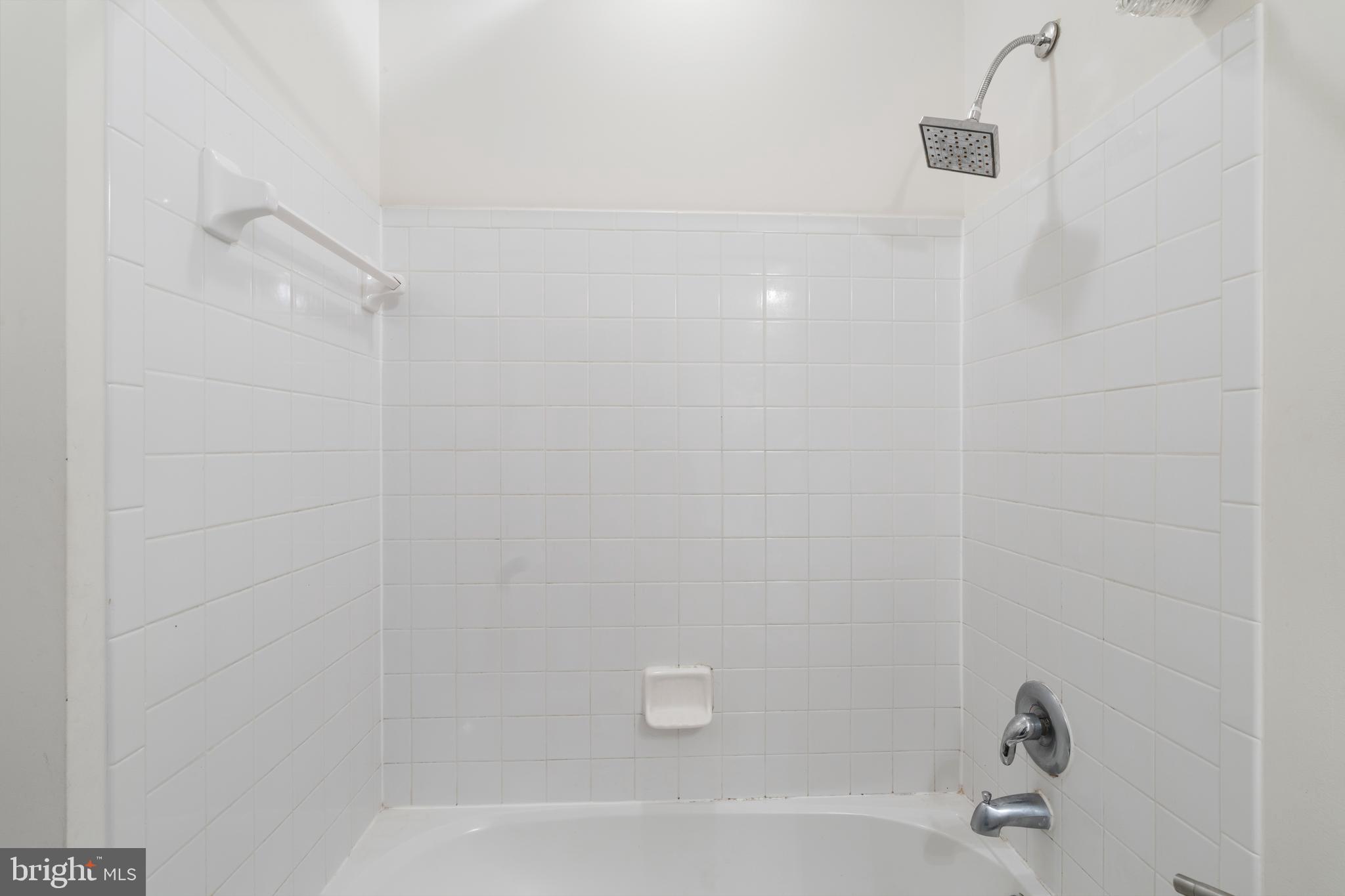 12461 Rose Path Circle Fairfax, VA 22033 - Photo 31 of 43 a bathroom with a bathtub