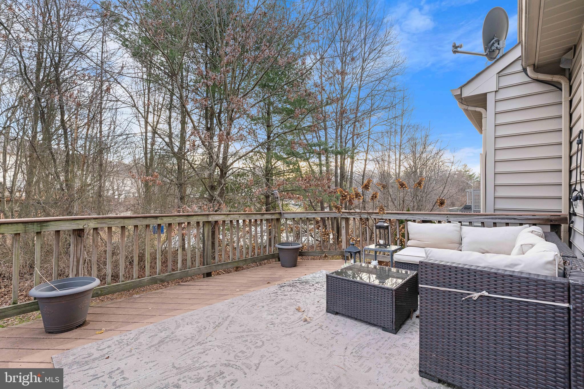 12461 Rose Path Circle Fairfax, VA 22033 - Photo 39 of 43 a view of a patio with couches and potted plants