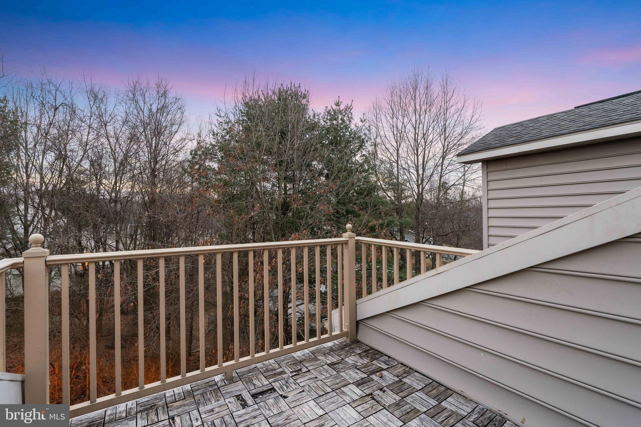 12461 Rose Path Circle Fairfax, VA 22033 - Photo 42 of 43 a view of a balcony with wooden fence and floor
