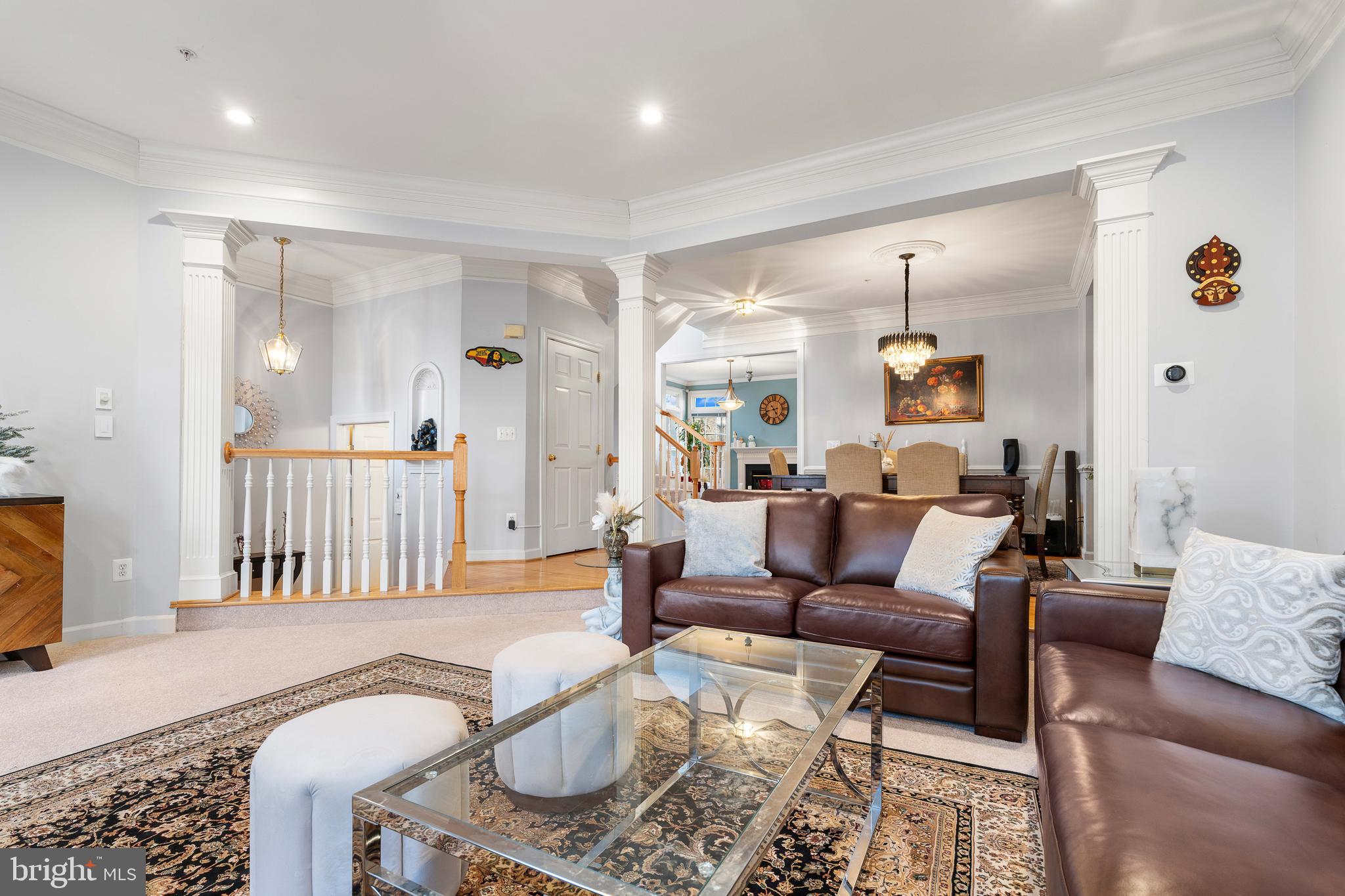 12461 Rose Path Circle Fairfax, VA 22033 - Photo 8 of 43 a living room with furniture and wooden floor