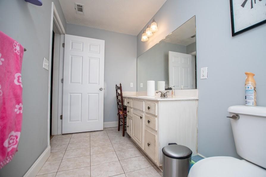 575 Liberty Church Road Carrollton, GA 30116 - Photo 54 of 95 a bathroom with a sink toilet and mirror