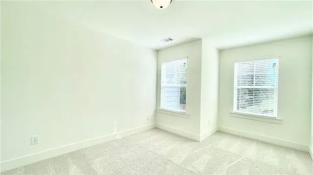 a view of a livingroom with wooden floor