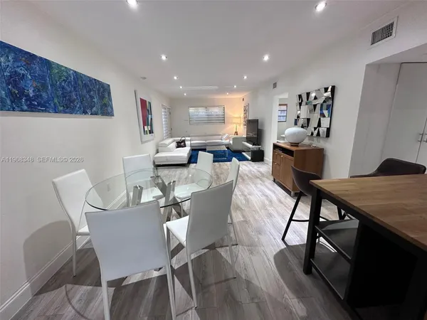 a view of a dining room with furniture