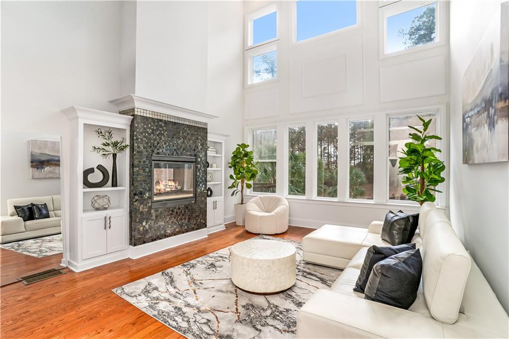 105 Ensley Point Fayetteville, GA 30214 - Photo 12 of 37 a living room with furniture and a potted plant