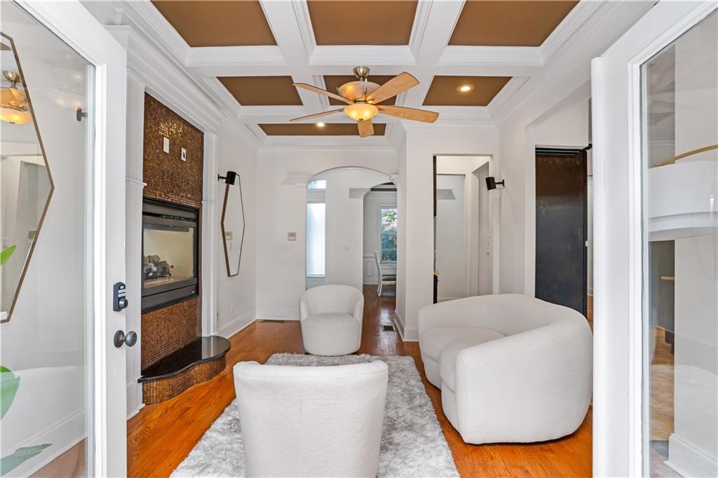 105 Ensley Point Fayetteville, GA 30214 - Photo 16 of 37 a living room with furniture and a fireplace